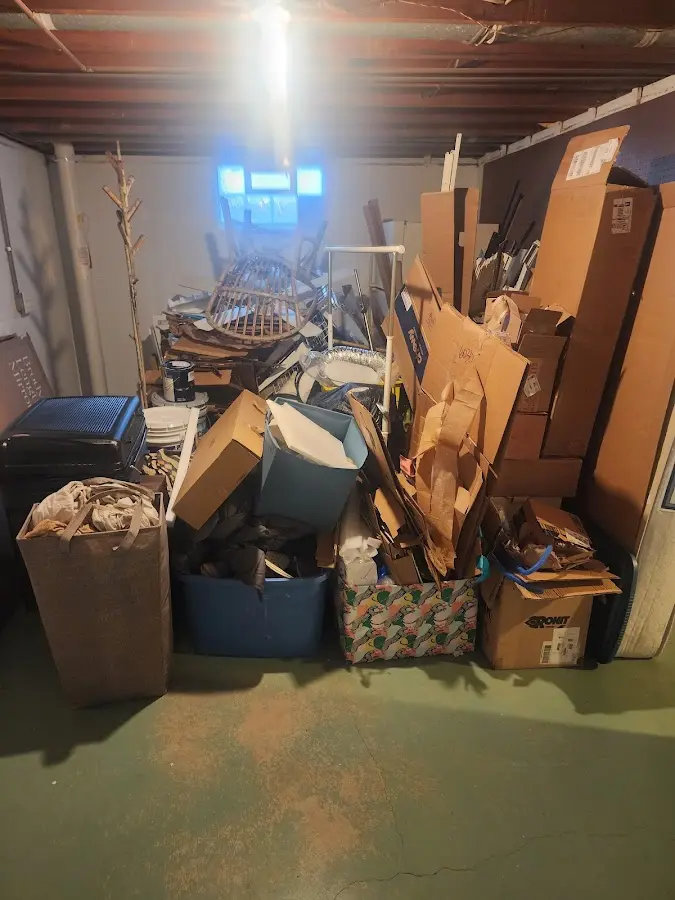 Roll-off dumpster container at job site for 6 Yard Dumpster Rental in Vernon